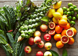 a group of fruits and vegetables on a wood surface Healthy Weight Loss Diets Yeovil